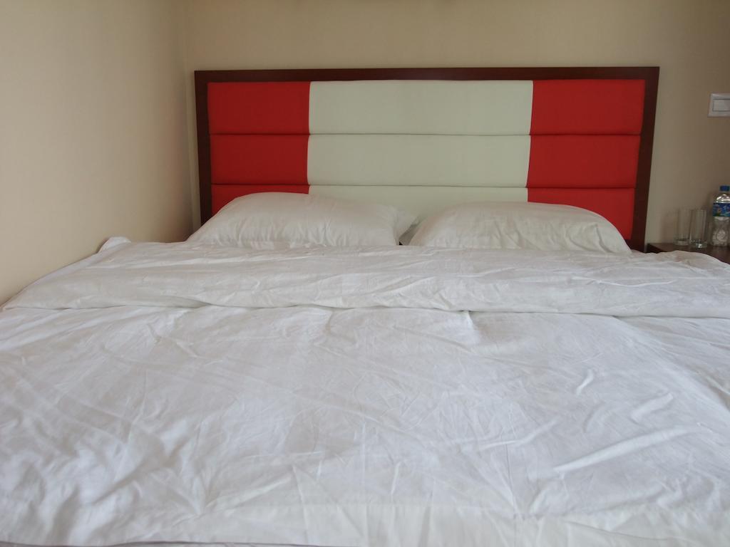 Chun Tian Hui Gu Holiday Hotel Куньмин Номер фото